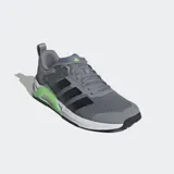 Championes de entrenamiento Adidas Dropset Control, color gris con detalles en negro y verde. Presentan ajuste ancho, mediasuela estable y sistema de torsión de TPU en el mediopié. El exterior es de tejido de malla.