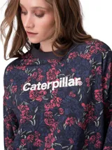 Buzo Caterpillar de cuello redondo en suave tejido french terry, de calce relajado y mangas largas. Presenta estampado floral completo en tonos azules y rojos, con el logo de la marca en el centro del frente y detalles de punto acanalado en puños, cuello y dobladillo.