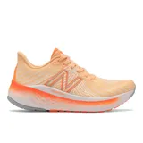 Championes de running New Balance WVNGOBM5 para mujer, color naranja con detalles en blanco y gris.