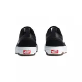 Championes Vans modelo Skate Old Skool con tecnología Wafflecup, color negro con detalles en blanco. Presentan una combinación de materiales en la capellada, cordones blancos, la icónica banda lateral de Vans y una suela de goma resistente con diseño de waffle.