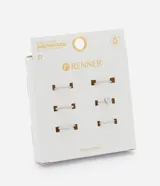 Kit de seis anillos de metal reciclado con diversos diseños, incluyendo aros lisos, texturizados, trenzados, ondulados y un modelo solitario con zirconia en forma de gota.