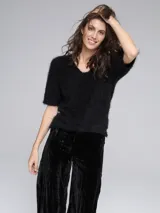 Pantalón palazzo de terciopelo color dorado con rayas verticales.