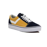 Championes Pony Champion Old School de lona, color amarillo y azul marino con logo blanco en el lateral.