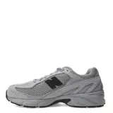 Championes urbanos New Balance modelo 509, color gris, con diseño robusto estilo dad shoe. Confeccionados con una combinación de malla transpirable y refuerzos sintéticos, cuentan con tecnología ABZORB en la mediasuela para una amortiguación superior y suela de goma resistente.