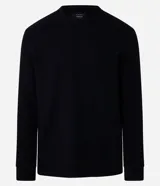 Remera de manga larga con cuello redondo y textura, de corte regular. Confeccionada en una mezcla de algodón, poliéster y viscosa.