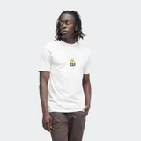 Remera blanca de algodón con cuello redondo y mangas cortas. Estampado frontal con el personaje Marvin el Marciano de Looney Tunes y el logo de Stance.