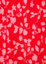 Falda midi de viscosa color rojo con estampado floral rosa, corte recto y cintura elástica.