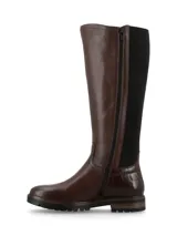 Bota alta de cuero marrón con elásticos laterales negros, talón con textura efecto reptil y suela track.