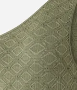 Body de hombro único con diseño sin mangas, confeccionado en tejido texturizado geométrico sin costuras. Cuenta con cierre en la entrepierna.