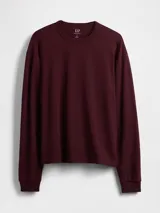 Remera de manga larga Gap, confeccionada en algodón de gramaje pesado, con cuello redondo y puños elásticos.