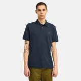 Chomba azul marino de piqué de algodón, corte clásico, cuello polo con dos botones y logo de Timberland bordado en el pecho.