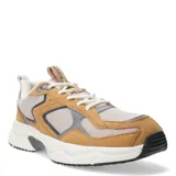 Championes de estilo running con diseño urbano, confeccionados en una combinación de malla y paneles de gamuza sintética en tonos tostado y gris. Presentan suela de goma gruesa con detalles en negro y blanco, cierre con cordones y tirador en la lengüeta.
