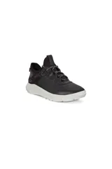 Championes Ecco ST.1 Lite color negro con suela blanca.