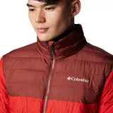 Campera acolchada de hombre con diseño bicolor en tonos rojo y bordó. Cuenta con cierre frontal completo, cuello alto con protección de barbilla, bolsillos laterales con cierre y puños elásticos. Presenta tecnología termorreflectante y aislamiento sintético para mayor retención de calor.