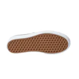 Championes Vans modelo Authentic Stackform, color negro con suela de plataforma blanca. Diseño clásico de lona con cordones blancos y costuras a la vista.