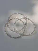 Pulsera elástica de cuentas de 2mm en oro laminado 14 Kilates (Goldfilled).