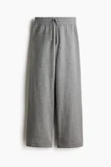 Pantalón deportivo de felpa con corte acampanado, cintura elástica con cordón ajustable e interior cepillado suave.