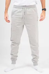 Pantalón de jogging unisex de felpa, color verde oscuro, con cintura elástica con cordón de ajuste y puños elásticos en los tobillos.