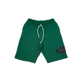 Bermuda verde de algodón con cordón ajustable en la cintura y parche bordado con el logo de la marca en el lateral.