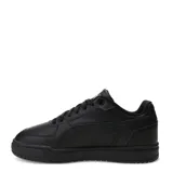 Championes urbanos Puma modelo Caven III, color negro con detalles en plateado. Presentan una silueta clásica de inspiración retro, con perforaciones en la puntera para mayor ventilación y suela de goma resistente.