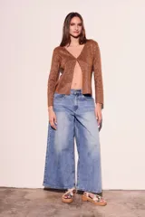 Cárdigan negro de lurex con escote en V y mangas largas.