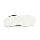 Championes Caterpillar Pause Retro T-Toe para mujer, color negro con detalles dorados y suela blanca. Confeccionados en cuero gamuzado con forro reciclado y plantilla de espuma EVA.