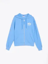 Buzo con capucha celeste de Tommy Hilfiger, con cierre de cremallera, bolsillos tipo canguro, puños y bajo de punto canalé. Logo de Tommy Hilfiger bordado en el pecho y en el ribete de la manga.