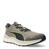 Championes de trail running Puma Reflect Lite, color beige con detalles en negro y amarillo. Presentan suela de goma con tecnología PROTREAD y entresuela de espuma EVA PUMALite.