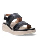 Sandalias de plataforma Lady Confort modelo Conques, con tiras superiores en color negro y base en color beige. Presentan un diseño ergonómico con ajuste de hebilla en el talón.