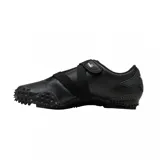 Championes Puma modelo Mostro Perforated, de diseño bajo con exterior de cuero perforado en color blanco y detalles en negro. Presenta una suela distintiva con relieve de tachones y cierre de velcro en el empeine.