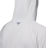 Remera de manga larga con capucha Columbia PFG, confeccionada en tejido técnico transpirable de secado rápido con tecnología Omni-Wick y protección solar Omni-Shade UPF 50. Presenta un diseño de corte holgado con logo de la marca estampado en el pecho.