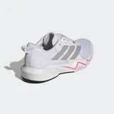 Championes de entrenamiento Adidas Rapidmove Go, diseñados para actividades de alta intensidad y gimnasio. Presentan un exterior de malla transpirable en color blanco con las icónicas tres tiras laterales en gris y detalles en fucsia. Incorporan tecnología Lightmotion en la mediasuela para una amortiguación ultraligera y tecnología Climacool para mayor frescura.
