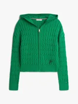 Buzo con capucha de Tommy Hilfiger, confeccionado en tejido de punto cableado color verde. Presenta cierre frontal de cremallera, mangas largas con puños acanalados y logo script bordado en la parte inferior.