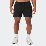 Short negro de entrenamiento con cordón ajustable en la cintura y bolsillos con cierre, diseño ligero y elástico con tecnología de secado rápido y antiolor.