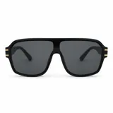Lentes de sol tipo escudo con armazón de policarbonato marrón oscuro y detalles metálicos dorados en las patillas, con cristales degradados en tonos marrones y protección UV400.