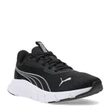 Championes deportivos Puma modelo Flexfocus Lite Modern, color negro con suela blanca. Presentan diseño de malla transpirable, cierre con cordones y logo de la marca en el lateral y la lengüeta.