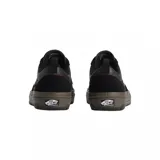 Championes Vans modelo Skate Old Skool con tecnología Wafflecup, color negro con detalles en marrón oscuro. Presentan una combinación de materiales en la capellada, incluyendo gamuza y tela técnica, con la clásica banda lateral de la marca y suela de goma reforzada.