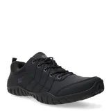 Championes urbanos Caterpillar de corte bajo, color negro, con diseño de costuras reforzadas en los laterales y suela de goma con relieve antideslizante.