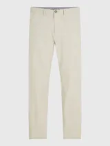 Pantalón de algodón elástico color crema con estampado integral de monogramas TH tonales en jacquard. Tiene dos bolsillos abiertos en la cadera y dos bolsillos traseros con botón.
