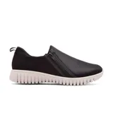 Championes deportivos casuales Usaflex, color negro, con diseño slip-on y cierre lateral con cremallera. Suela blanca con diseño acanalado.