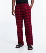 Pantalón de pijama de franela con estampado de cuadros en tonos rojos y negros, cuenta con cintura elástica y cordón de ajuste.