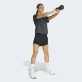 Short de entrenamiento Adidas Workout Essentials 2 en 1 color negro, con diseño deportivo, cintura elástica de tiro medio y el logo de la marca estampado en blanco.