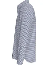 Camisa de corte regular confeccionada en algodón Oxford, con estampado de cuadros Vichy en color azul y blanco. Cuenta con cuello abotonado, cierre frontal de botones y mangas largas con puños ajustables. Incorpora un pequeño logo bordado de la marca en el pecho.
