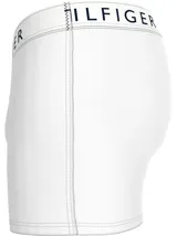 Pack de tres calzoncillos tipo trunk de Tommy Hilfiger, confeccionados en algodón elástico. Incluye un modelo blanco, uno negro y uno gris melange, todos con cintura elástica con el nombre de la marca estampado.