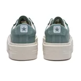 Championes Converse CTAS Cruise OX, color celeste con suela blanca de plataforma.