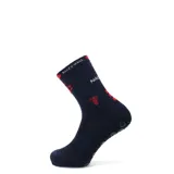Medias deportivas de caña media color azul marino, con detalles en rojo y blanco. Presentan el logo del Club Nacional de Football y la marca Tiffosi, con refuerzos antideslizantes en la planta del pie.